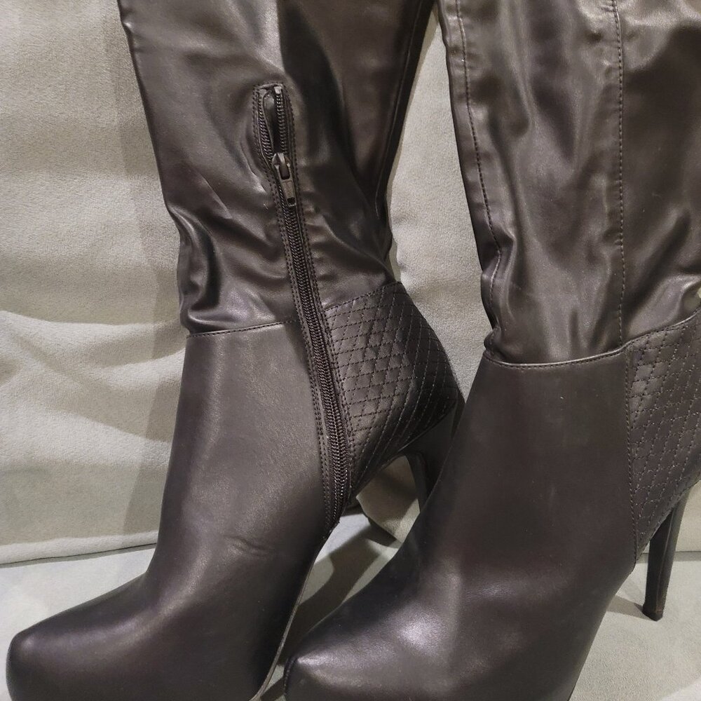 Black Jennifer Lopez knee high boots